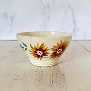 Fransk kaffeskål med orange blomster