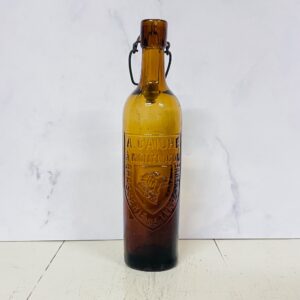 Antik flaske fra Montluçon med hundehoved